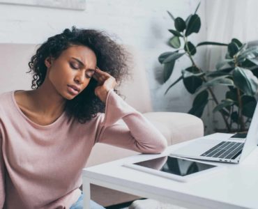 Woman tired while working from home